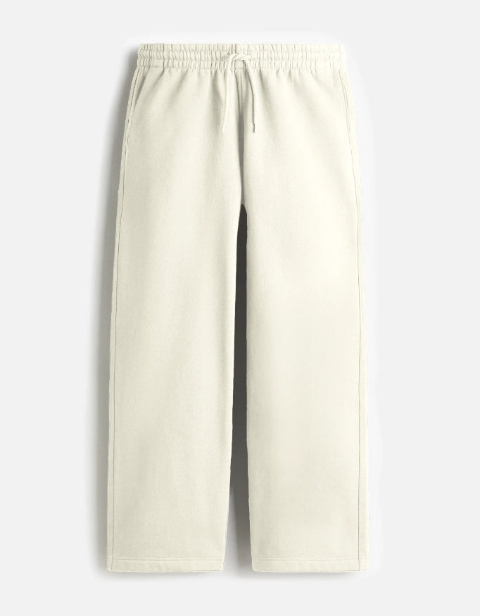 Euphor Bliss unisex cream sweatpants in a relaxed loose-fit style with an elastic drawstring waist and side pockets