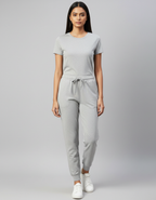 Euphor Bliss unisex grey cotton joggers with a tapered fit, ribbed cuffs, and drawstring waist worn by a model